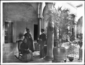 General Luis Torres and wife at their residence in Los Angeles or Mexico, ca.1906-1930