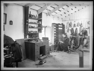 Interior of the shoe shop at Mission Santa Barbara, 1898-1900