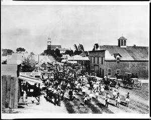 Funeral procession of Owen Brown on Colorado Street looking east from Raymond Avenue in Pasadena, Los Angeles, January 10, 1889