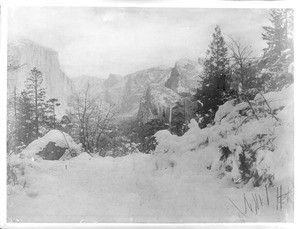 Snow-covered rocks and trees in Yosemite National Park, from Artist Point, ca.1850-1930