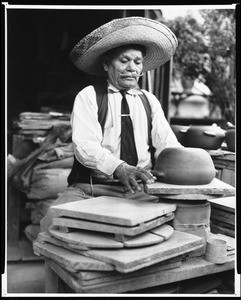 Portrait of a man at a potter's wheel on Olvera street, ca.1940-1949