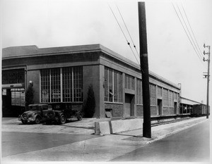 Exterior view of Southern Pacific Automobile Station at the corner of Eighth Street and Alameda Street