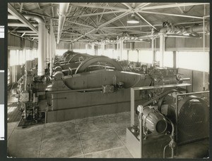 Interior view of the propane compressor plant at the Triton oil refinery, ca.1940