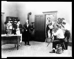 Filming of a kitchen scene on a sound stage