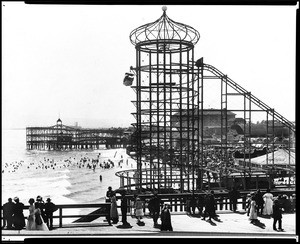 View of the Long Beach Pike amusement park looking west from the Pine Avenue Pier, ca.1890