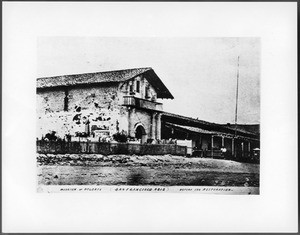 Exterior view of the Mission San Francisco de Asis, prior to its restoration, taken by artist and photographer Edward Vischer, 1873