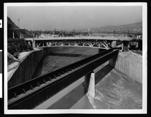 Flooded Los Angeles River at the Dayton Avenue bridge, 1938