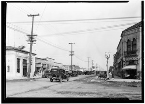 La Brea Avenue in Los Angeles, showing many shops and automobiles