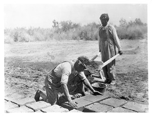 Adobe brick makers at work, 1900-1909