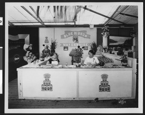 Blue Ribbon Mayonnaise booth at a fair for the Curtis Corporation, ca.1930