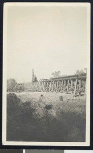 Flume (?) on a dry river bed, ca.1910
