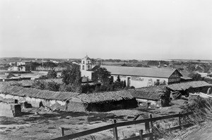 View of Mission San Buenaventura and early Ventura from behind and east of the mission, ca.1883