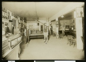 Portrait of John and Charles Baxter posing in the billiard parlor, 1908