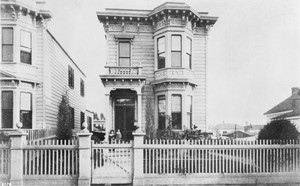 Exterior view of Nathan Jacoby Restaurant on the east side of Broadway, south of Third Street, ca.1890