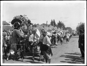 Chinese dragon in a parade, ca.1900