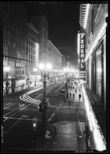 Christmas decorations at night on Broadway near the Federal building and Majestic, 1930-1931