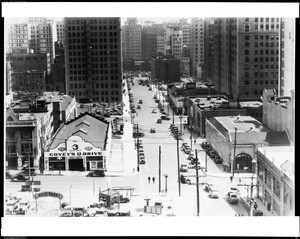 View of the intersection of Wilshire Boulevard and Figueroa Street after the improvement of Wilshire, December 6, 1934