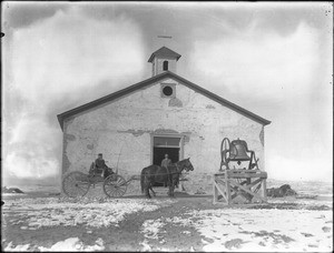 Bell and horse-drawn wagon in front of a mission, Arizona or New Mexico, ca.1903