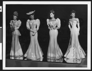 Close-up of a display of figurines depicting women, ca.1950