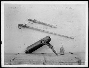 Cannon, sword, machete and metal lamp from the first Father Junipero Serra's first California expedition, 18th century