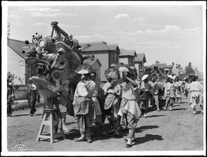 Chinese dragon in a parade, ca.1900