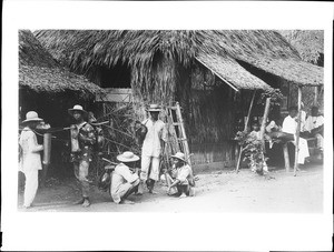 Group of milkmen on a street in Manila, Philippines, ca.1900