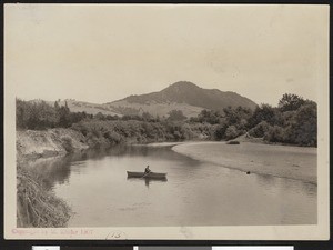 Man rowing on the Russian River near Fitch Mountain in Healdsburg