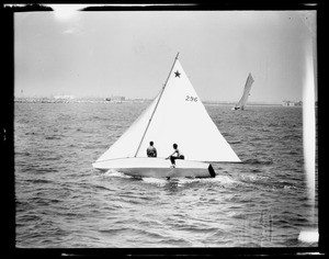 Two people in a sailboat in Long Beach