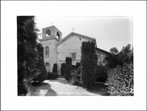 Bell tower and church front of Mission San Juan Bautista, California, from the southeast, 1927