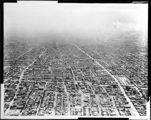 An aerial view of Los Angeles, showing San Pedro Street east towards Central Avenue and south from 8th Street, ca.1910