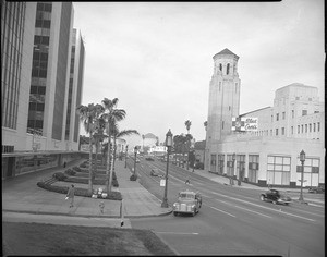 View of Wilshire Boulevard looking west from Mariposa Avenue, showing a truck making a turn, ca.1953