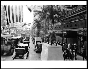 View of Broadway and 4th Street, showing the Broadway Department Store (at right), Los Angeles, 1925
