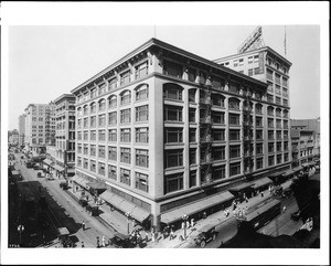 View of the corner of Seventh and Broadway looking west, showing Bullock's Department Store, Los Angeles, ca.1920