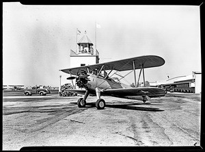 U.S. Army airplane near a runway and control center