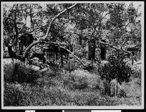 Exterior view of the rustic stone house of Charles F. Lummis, Pasadena, 1910