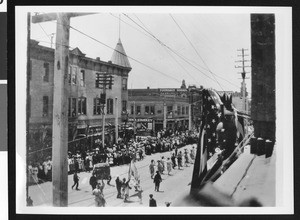 View of San Diego's 5th Street in the Chinese division with a 4th of July parade, 1903