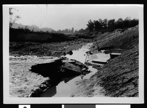 Flood damage in an unidentified area, showing debris, 1938