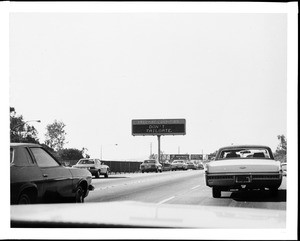 Electric sign on the Santa Monica Freeway warning drivers not to tailgate, January 24, 1974