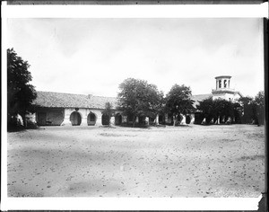 External front view of Mission San Juan Bautista, after partial destruction of the tower, ca.1902