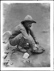 Placer miner on the Colorado River near Lees Ferry, ca.1930