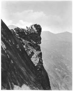 Sphynx-like rock formation on the side of a cliff at Kings River Canyon, ca.1900-1940