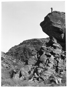 Indian Marcus standing on Lookout Point, Lookout Rock, Palm Canyon, near Palm Springs, ca.1900