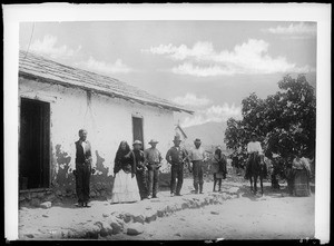 Captain Pedro Pablo, his wife, and other Indians at his house at Pauma, 1885