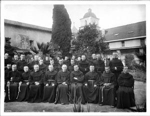 Group portrait of about 30 Franciscan monks outside at Mission Santa Barbara, California, 1904