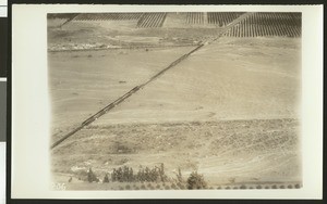 Aerial view of flooding of a railroad bridge, the A.T. & S.F.R.R., ca.1930