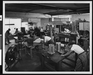 Electronics (?) plant with workers, ca.1940