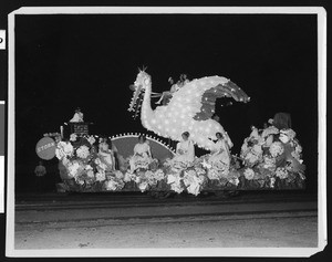 Crane-shaped float in Shriner's electrical parade, ca.1910