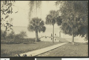 Boats moored on a lake, ca.1900