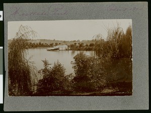 View of a boathouse on the lake in Westlake Park in Los Angeles, ca.1900