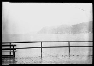 Catalina Island harbor, showing guardrail of ship in extreme foreground, November 11, 1927
